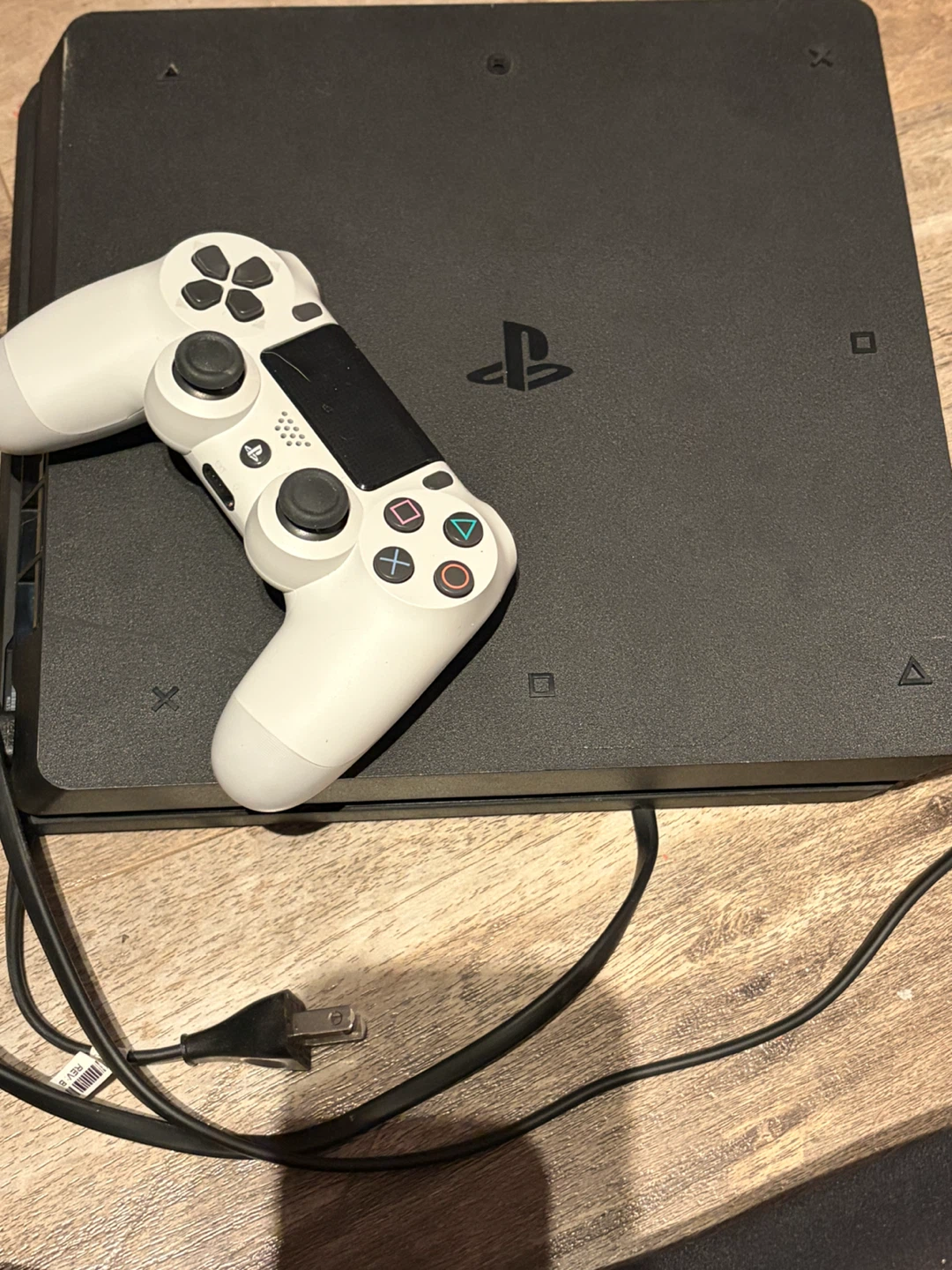 PlayStation 4 Slim Console with Controller