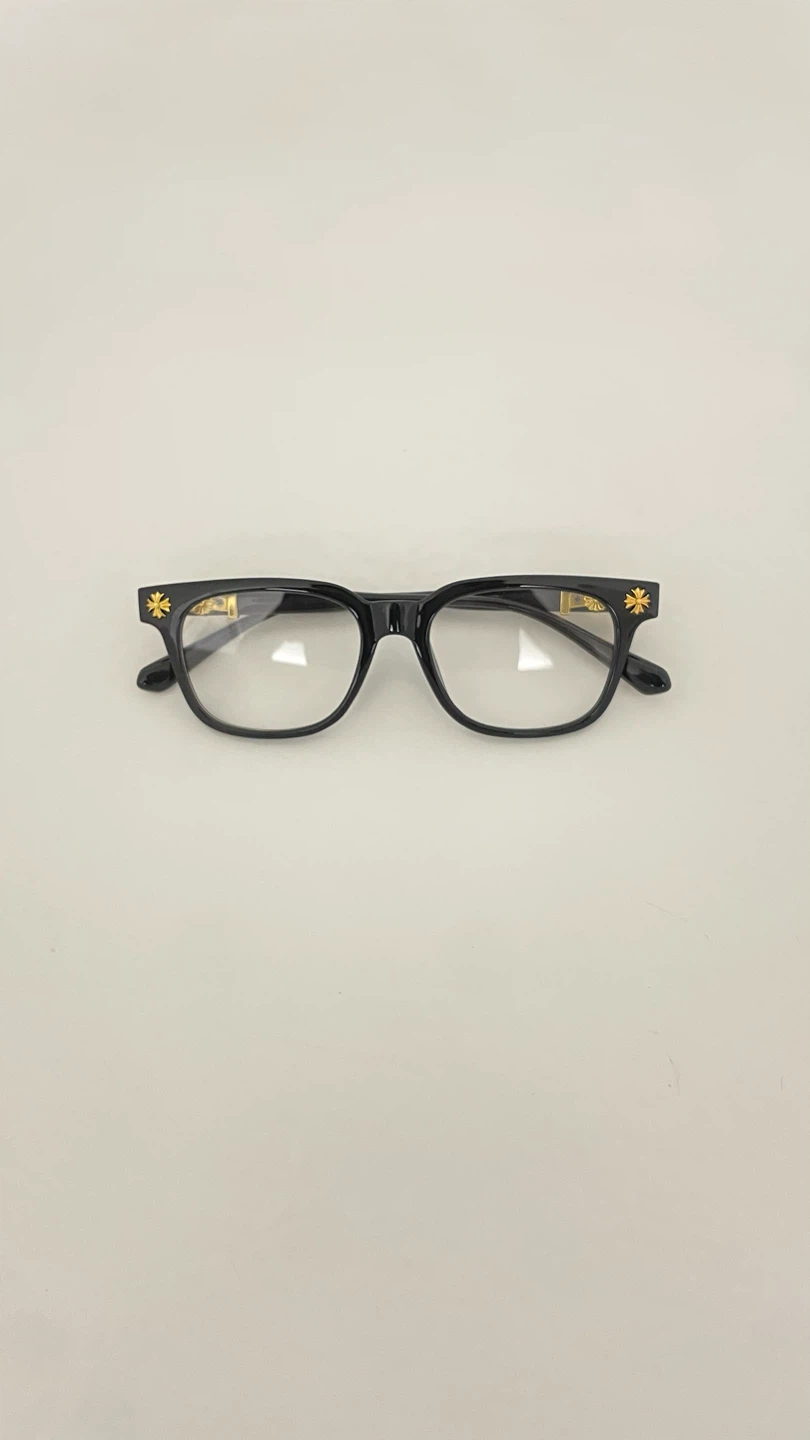 Chrome Hearts glasses with gold accents