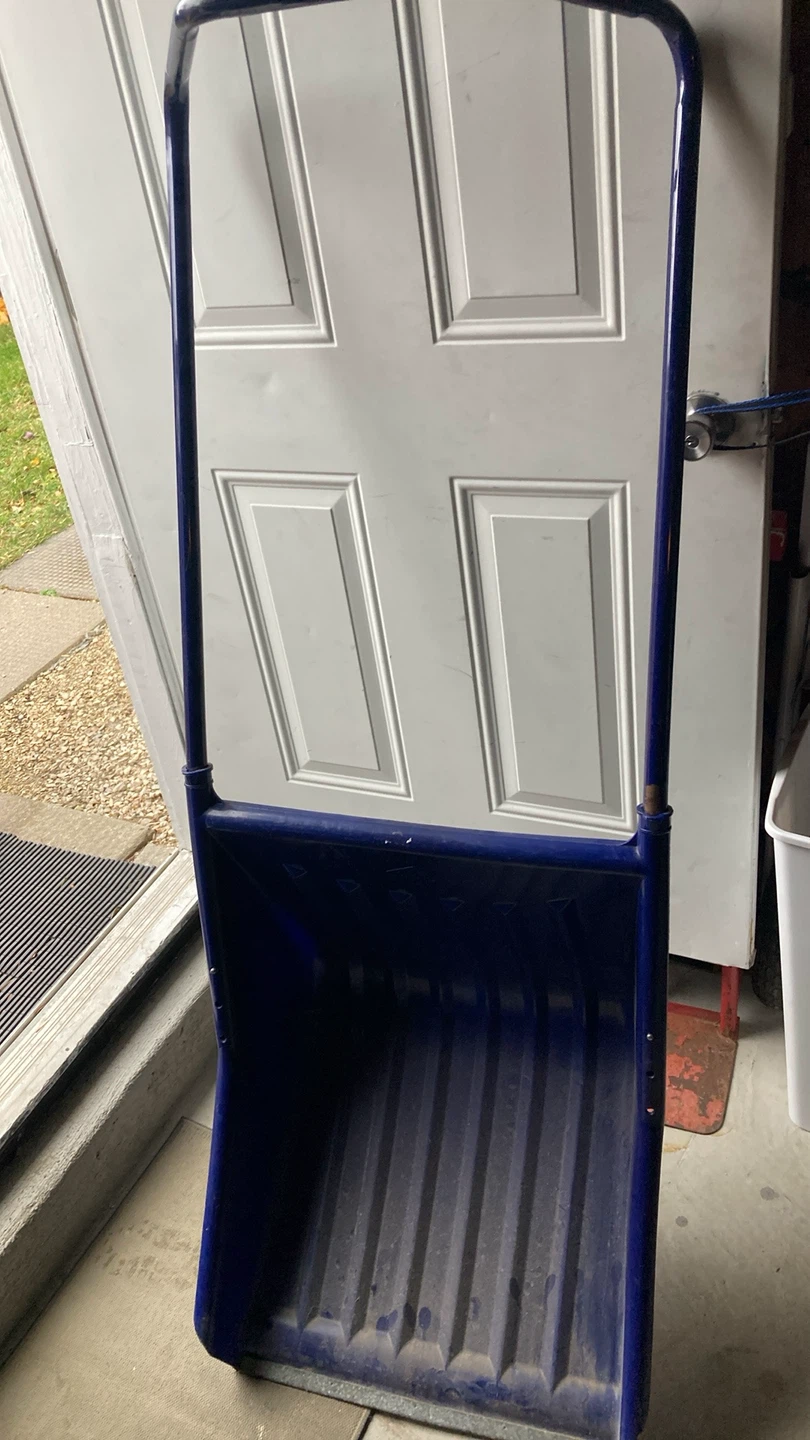 Blue plastic snow pusher