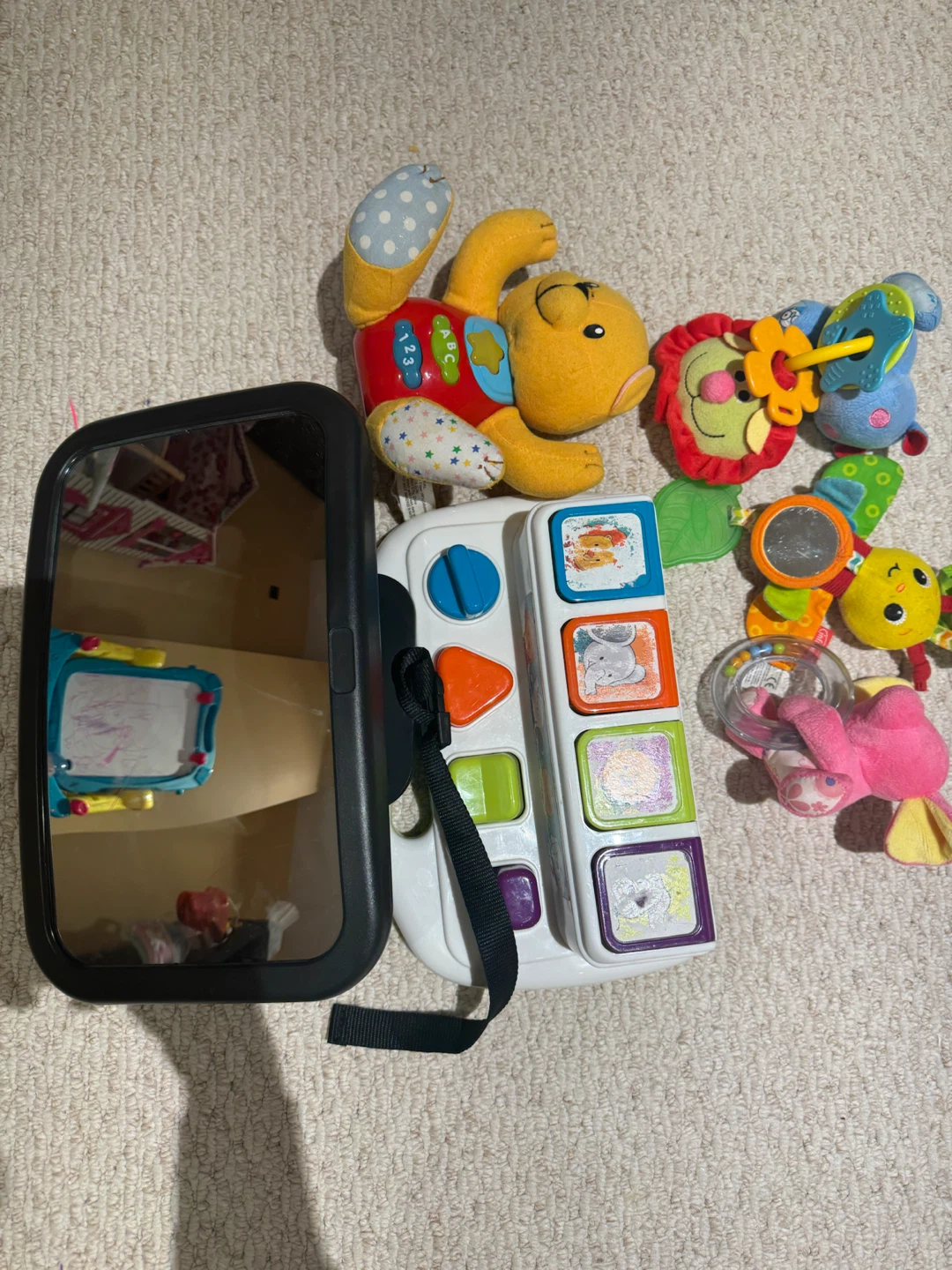 Baby car mirror and developmental toy bundle