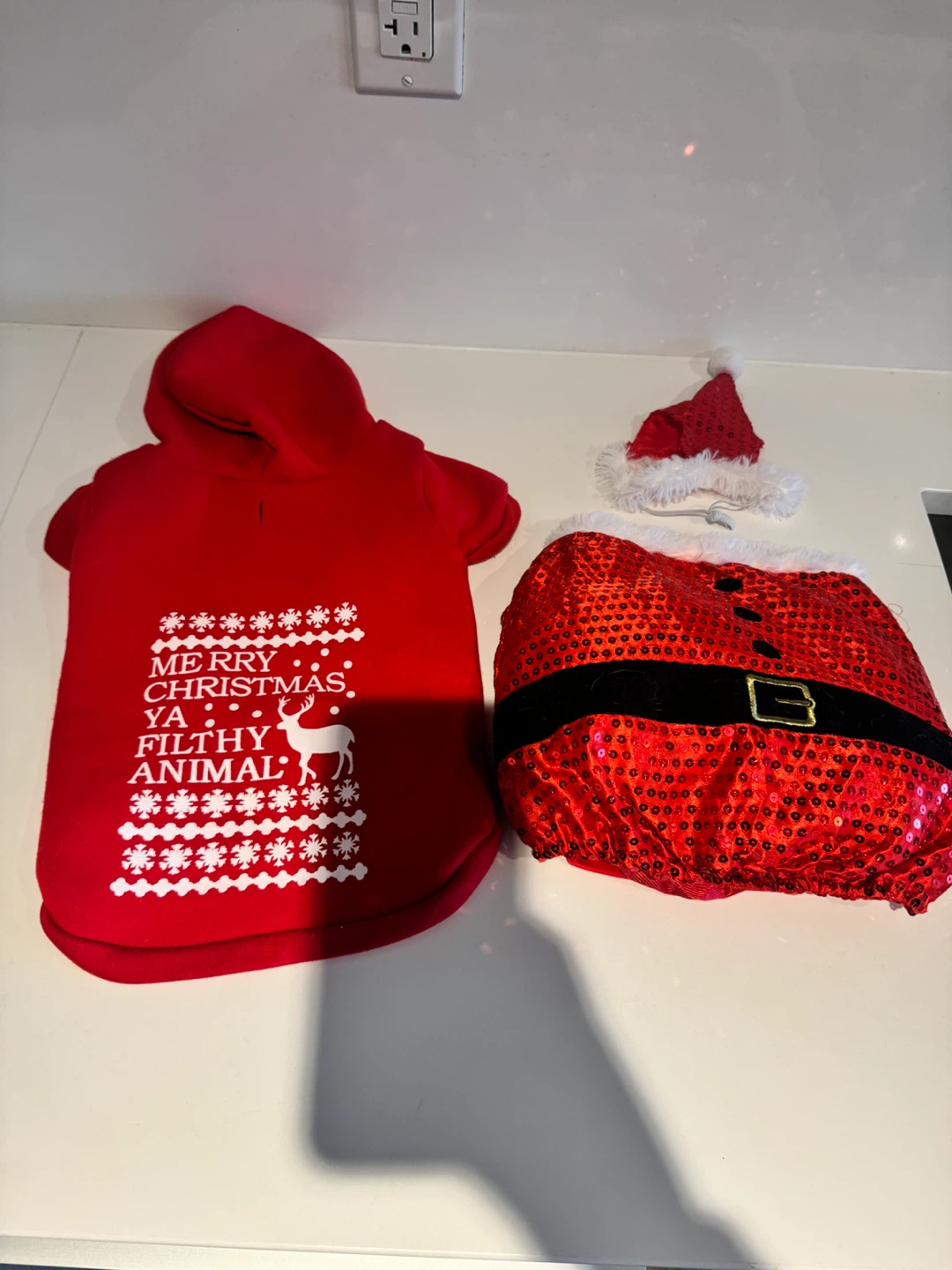 Two Christmas pet costumes