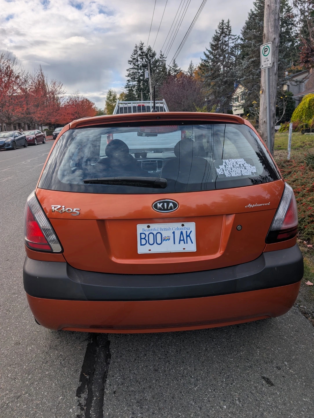 Orange Kia Rio5 hatchback - photo 3