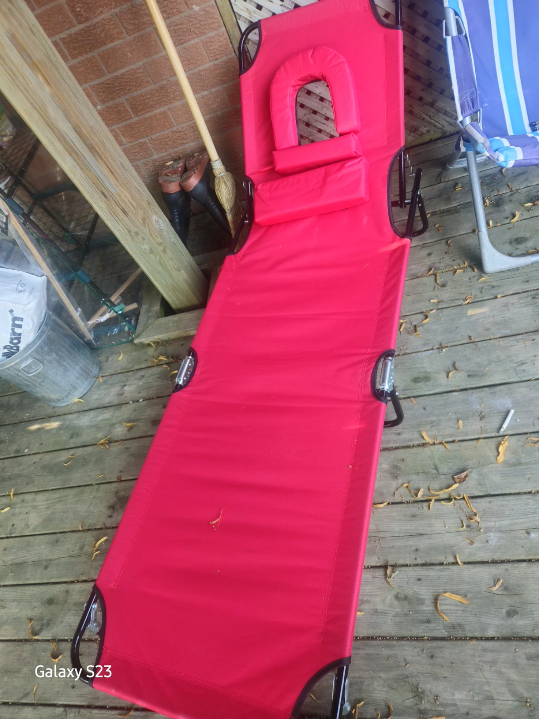 Red folding sun lounger