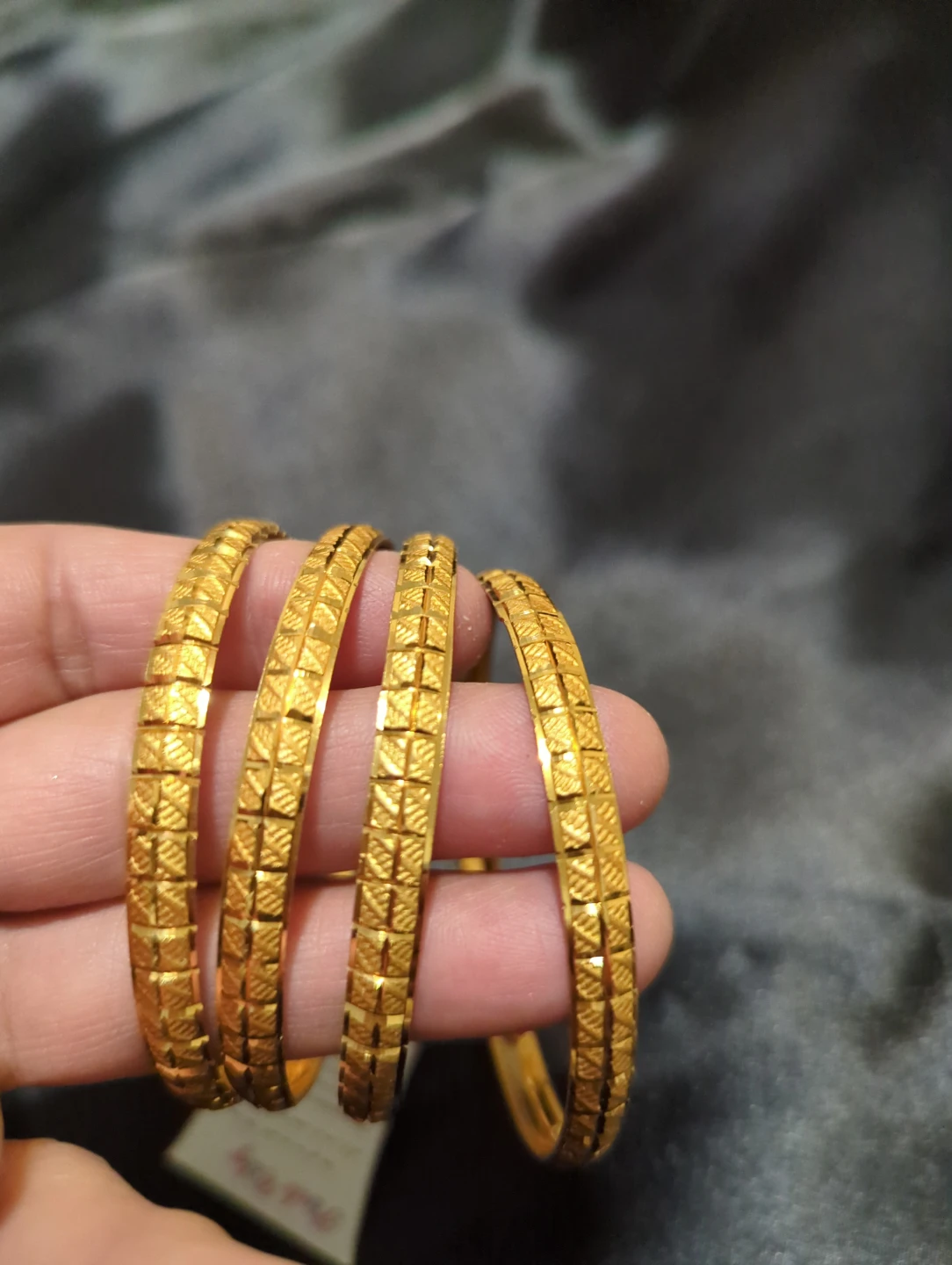 Set of 4 Gold-Tone Textured Bangles