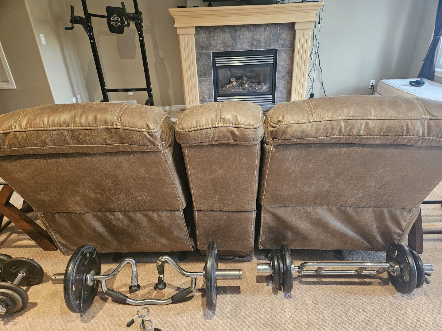 Brown Leather Reclining Loveseat - photo 4