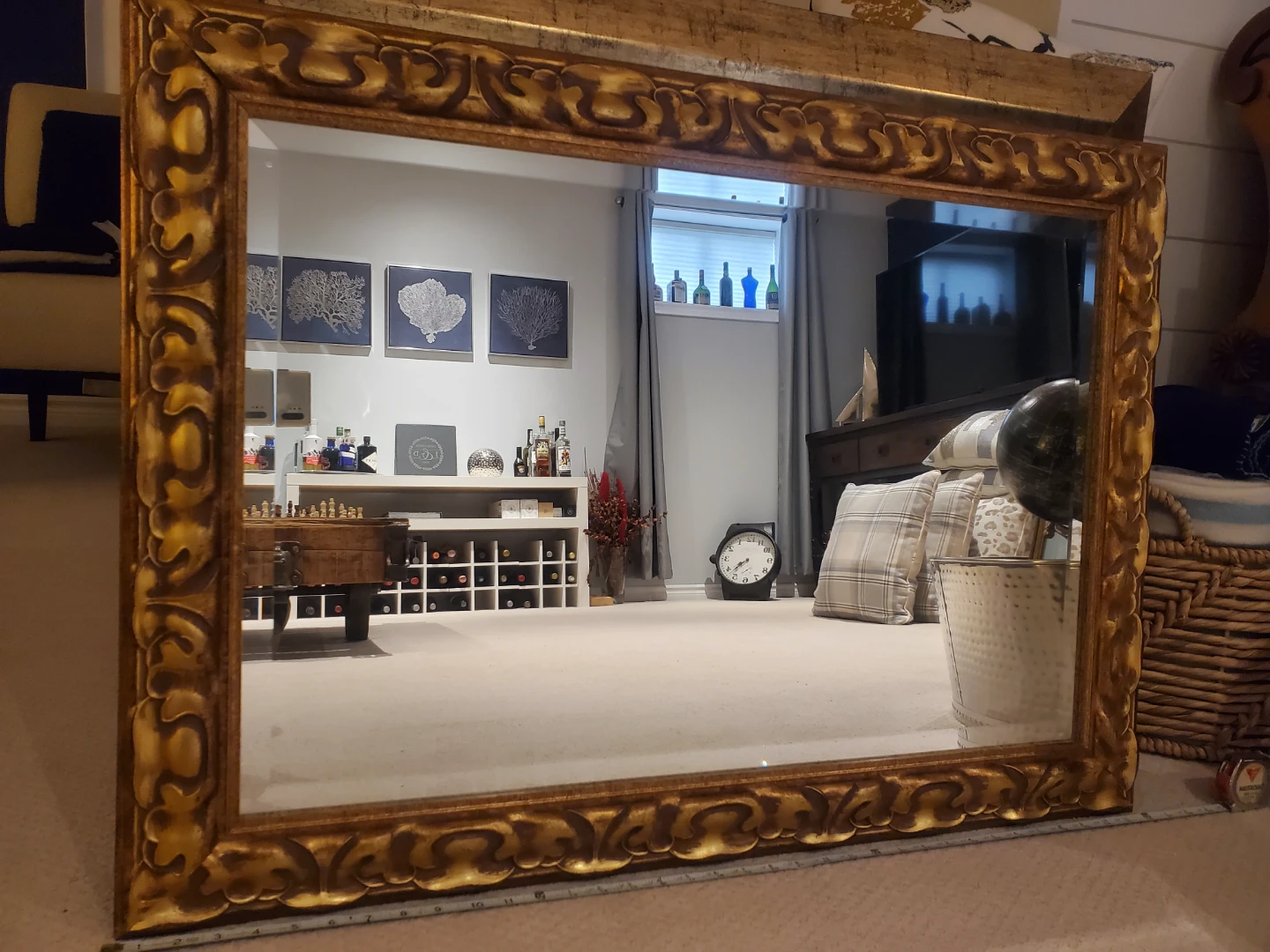 Large ornate gold-toned wall mirror