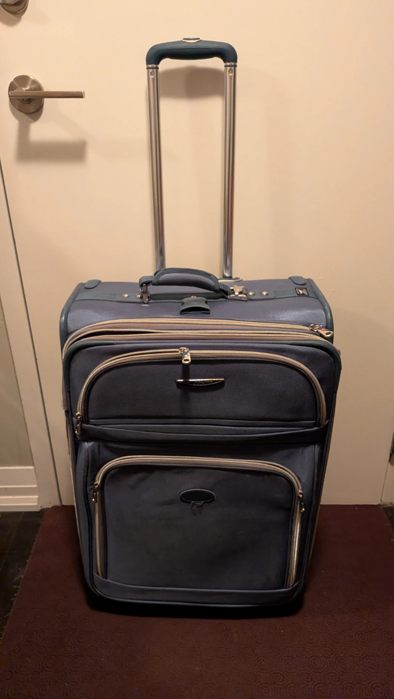 Blue Rolling Carry-On Luggage
