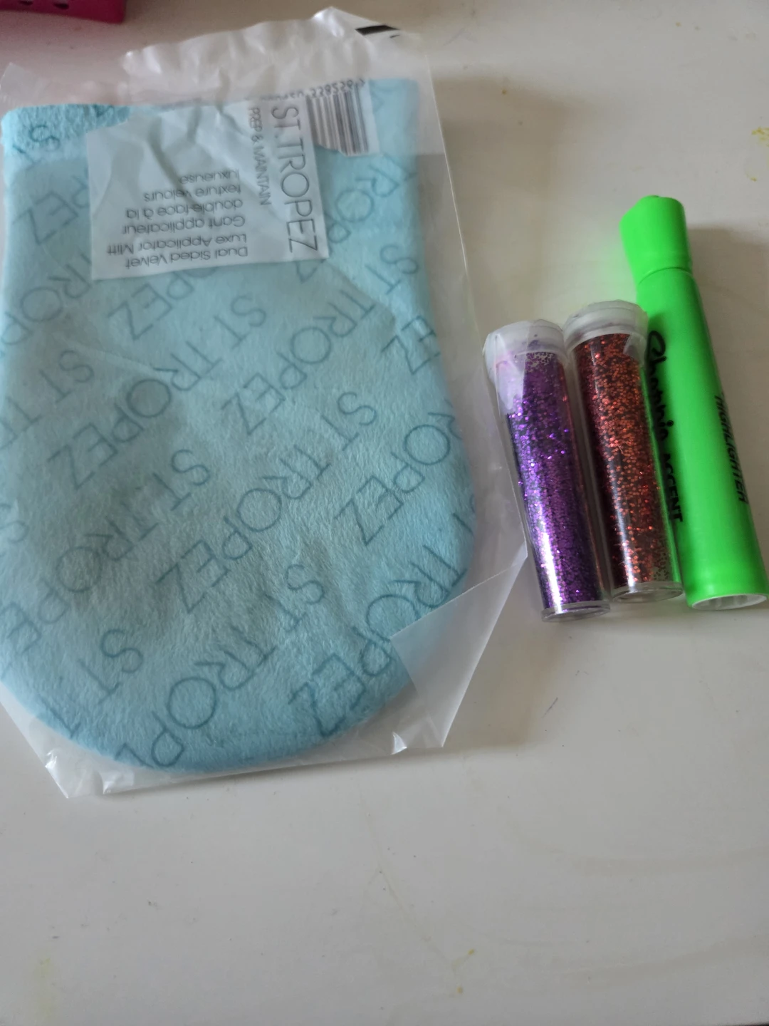 St. Tropez tanning mitt and glitter tubes