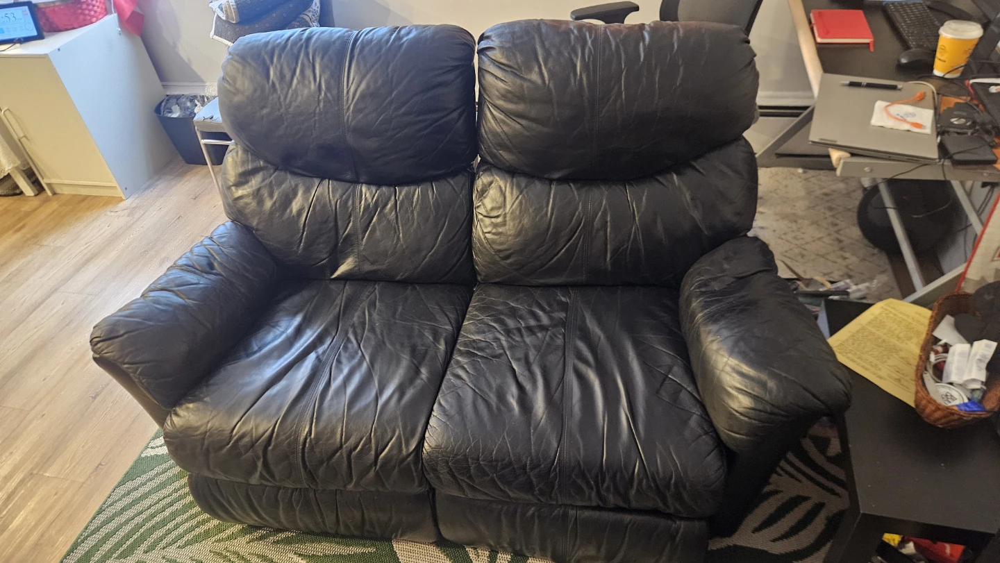 Black Leather Reclining Loveseat - photo 2