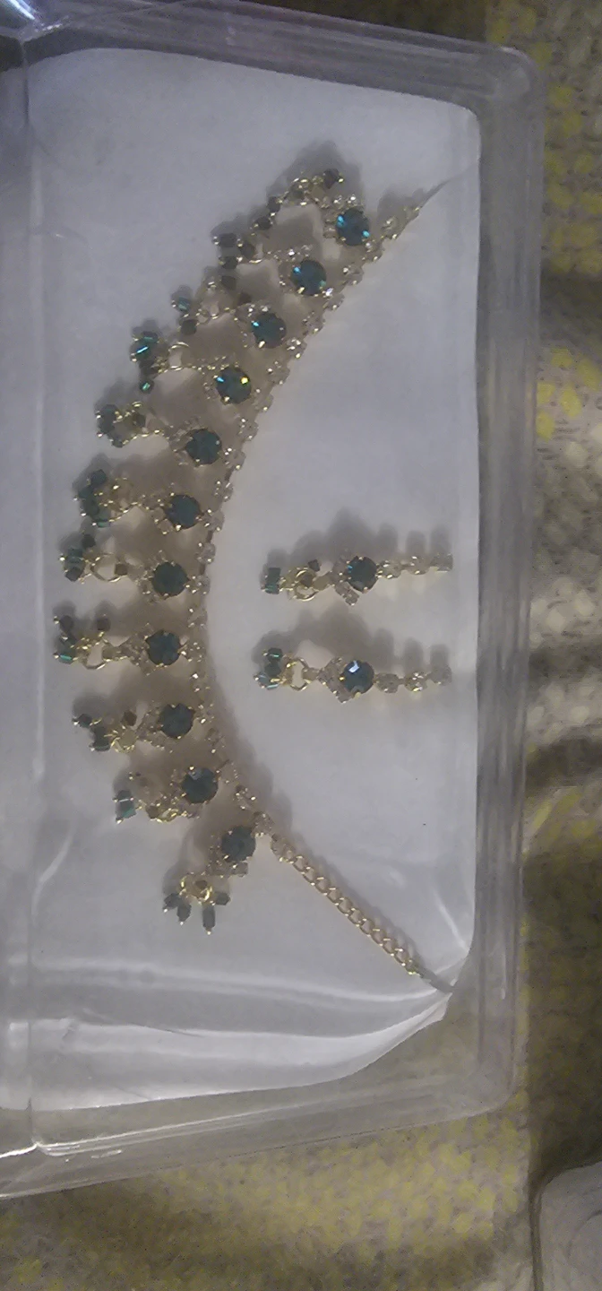 Gold-tone necklace and earring set with dark teal stones