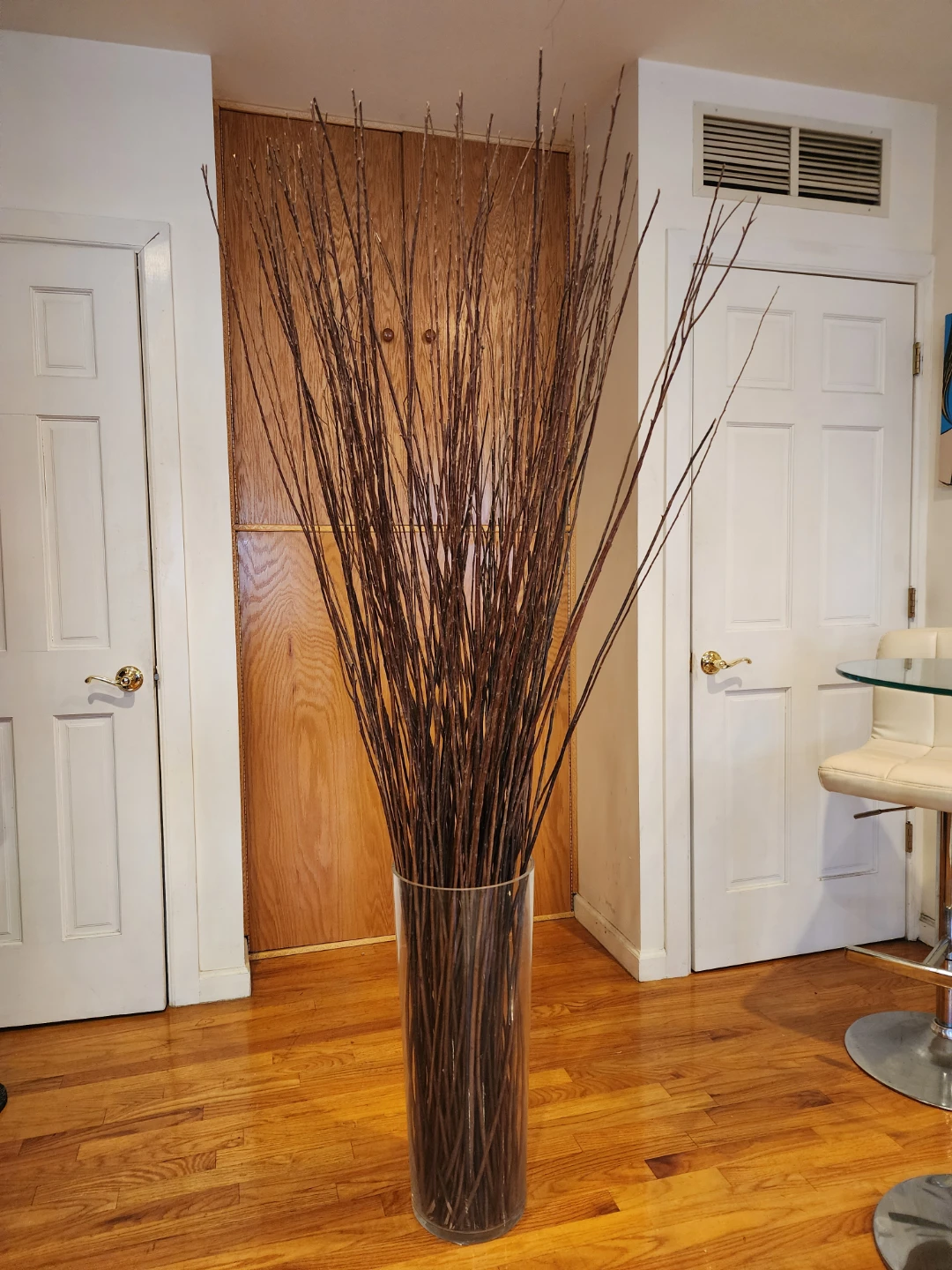Tall Glass Floor Vase with Decorative Twigs