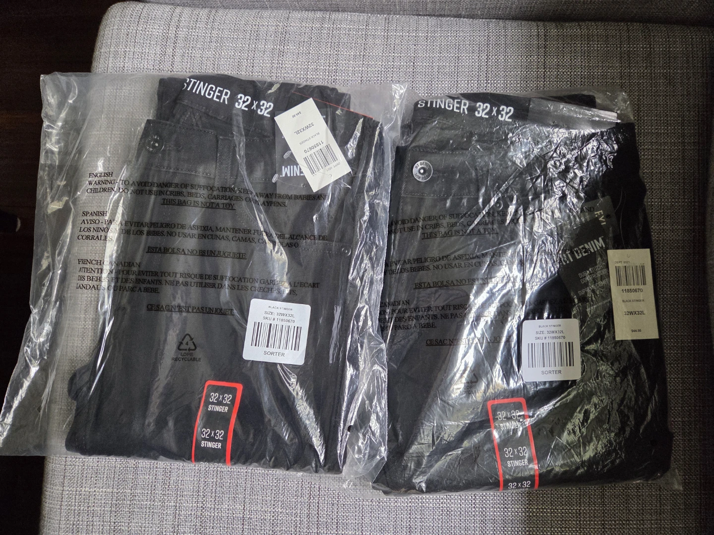 Two Pairs of Black Stinger Jeans 32x32