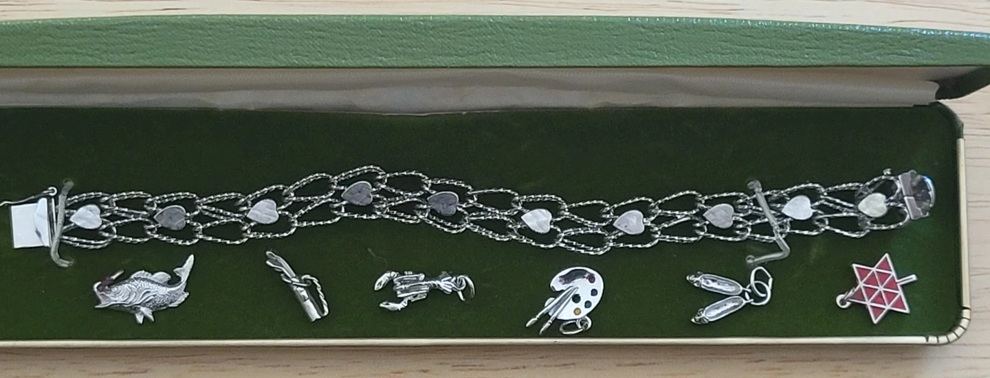 Sterling silver vintage charm bracelet with 6 charms