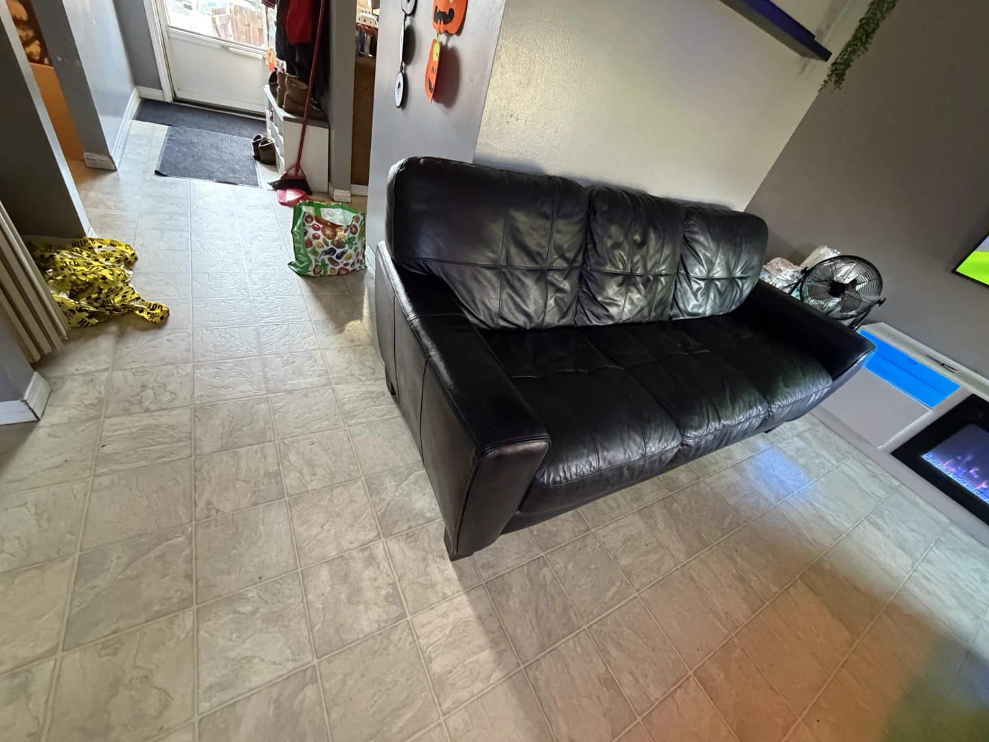 Black leather sofa and love seat