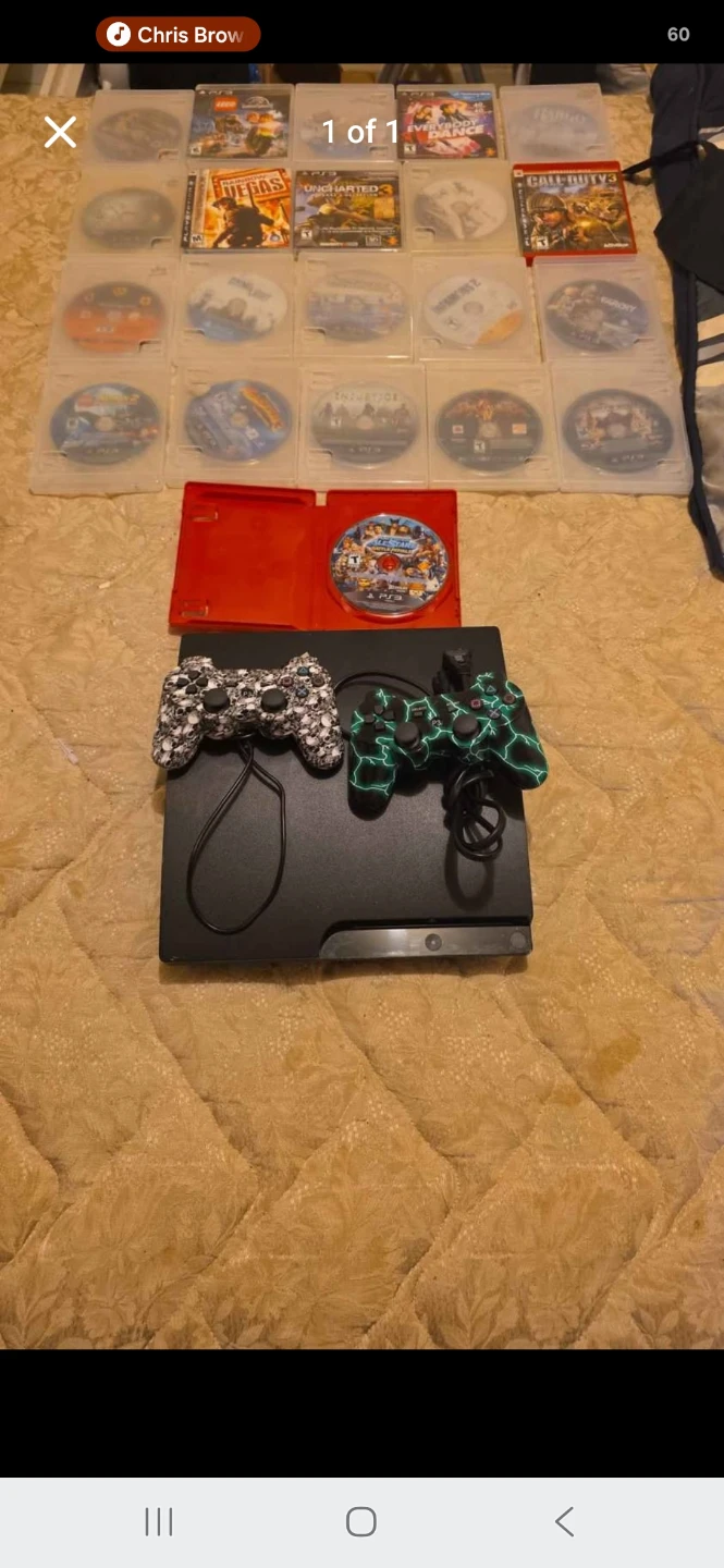 PlayStation 3 Console with Controllers and Games