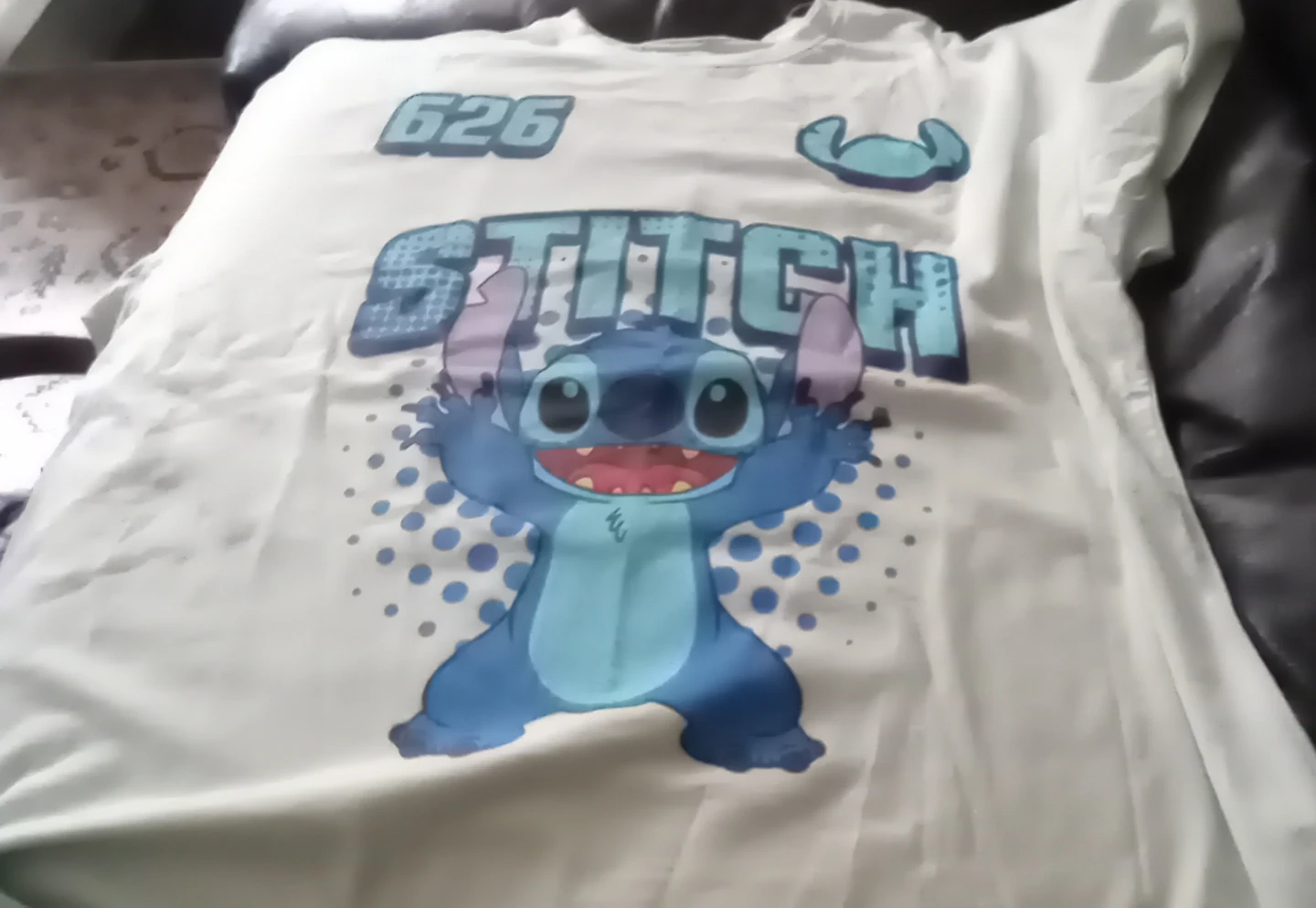 Two stitch clothes ( one blue, one light pink) they are both XL