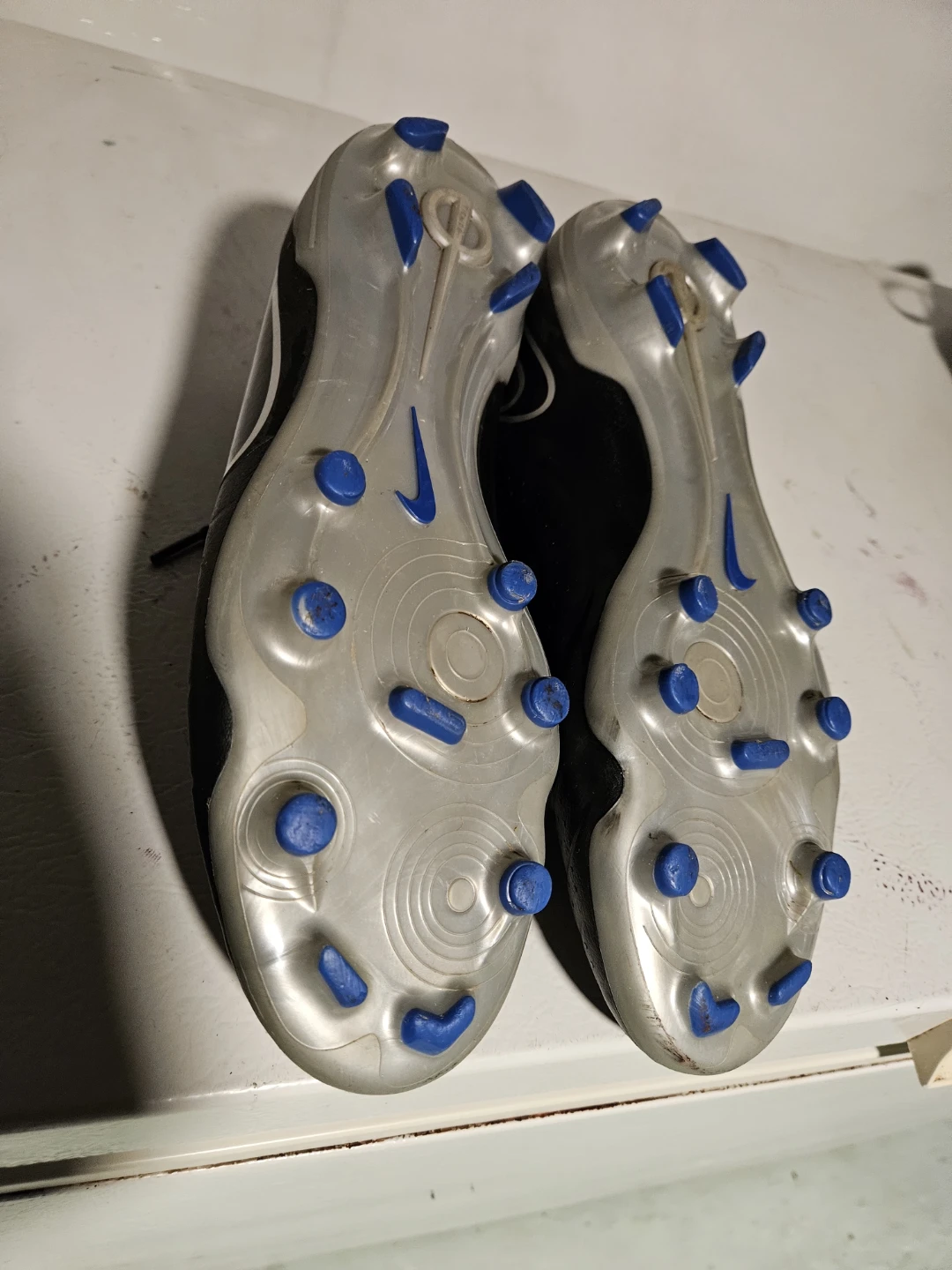 Three pairs of assorted athletic cleats - photo 4