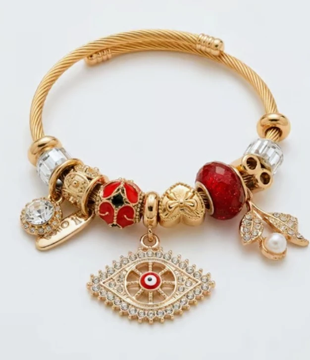 Gold Tone Charm Bracelet with Evil Eye
