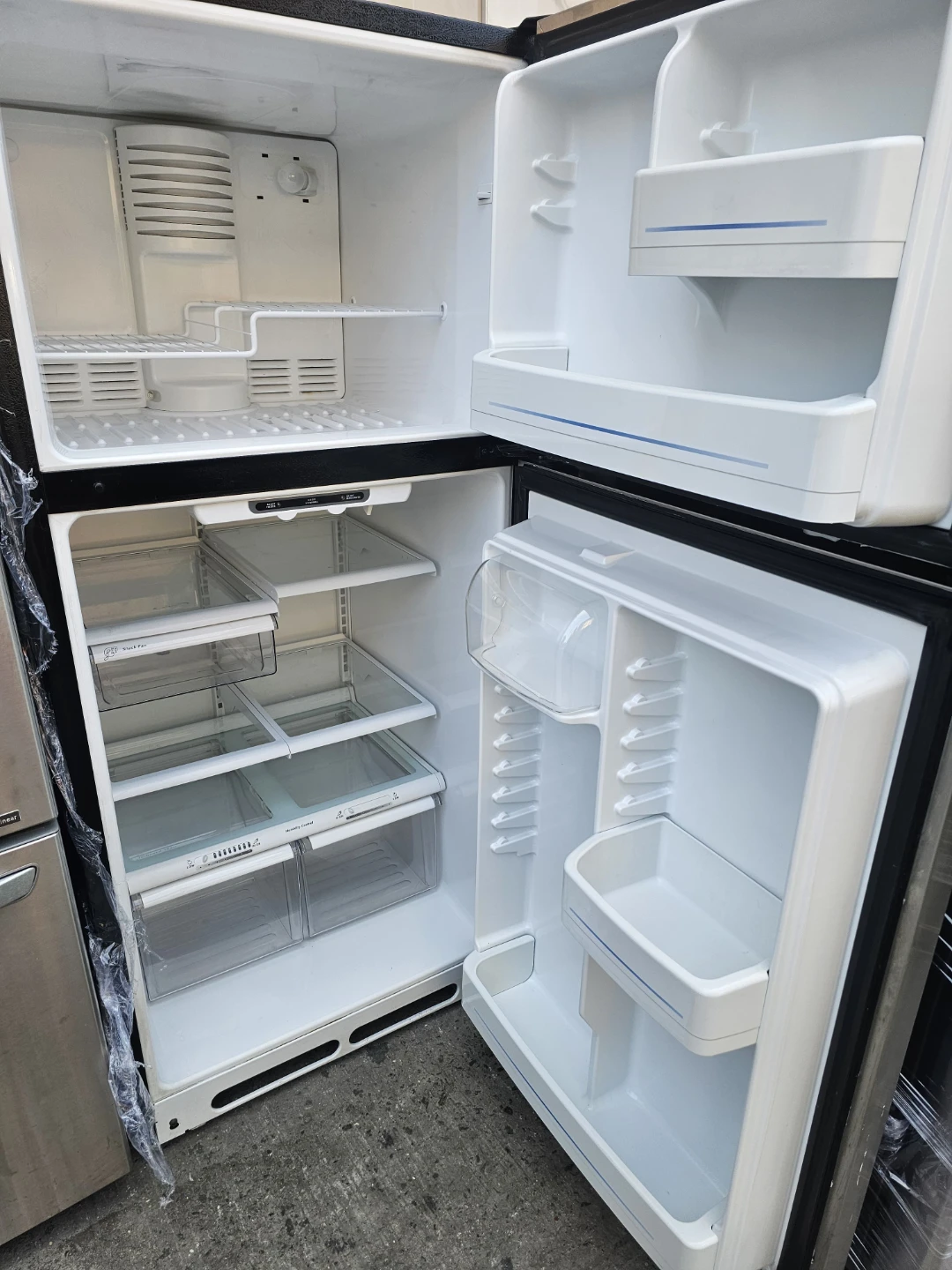 GE Stainless Steel Top-Freezer Refrigerator - photo 2