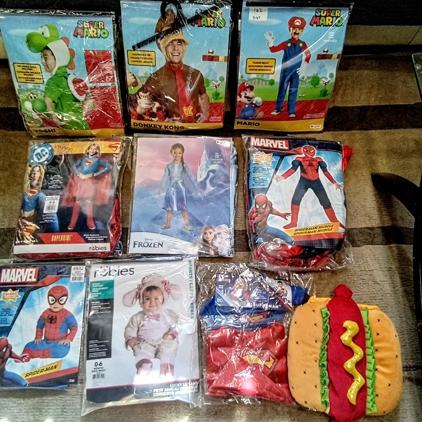 Assorted kids Costumes, Donkey Kong is Adult, Hot Dog is pet