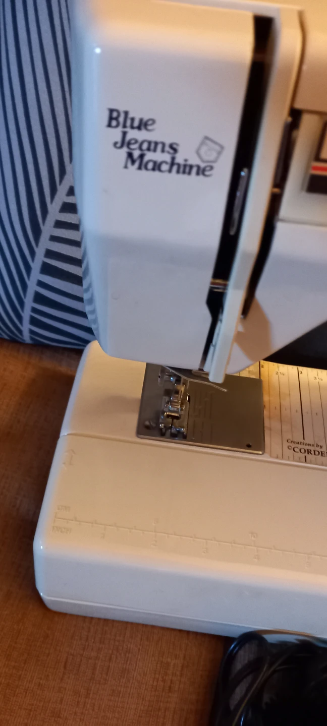 White Blue Jeans Machine Sewing Machine