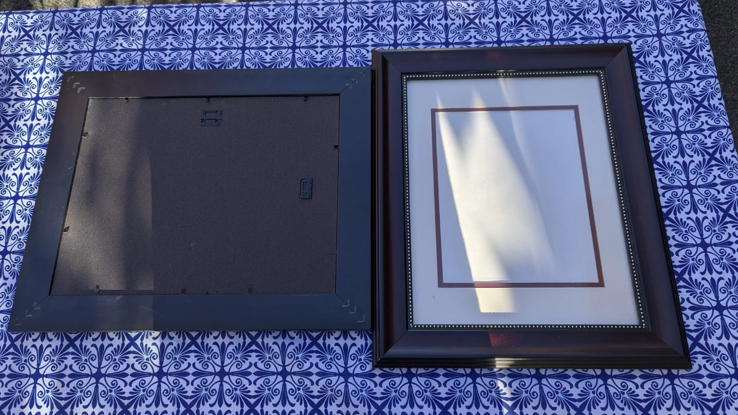 Two Dark Wood Picture Frames