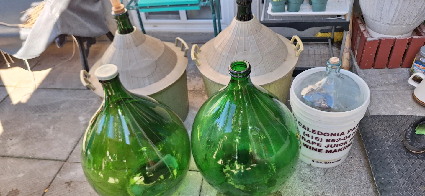 Assorted Glass Carboys and Wine Making Supplies