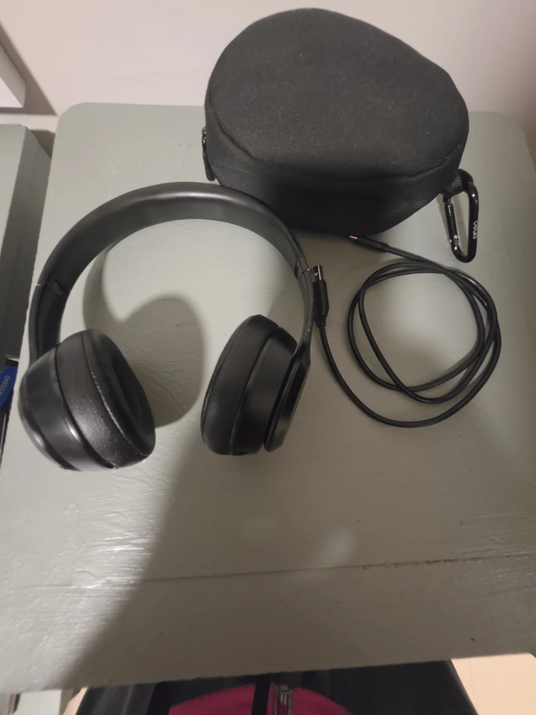 Beats headphones with case and charging cable