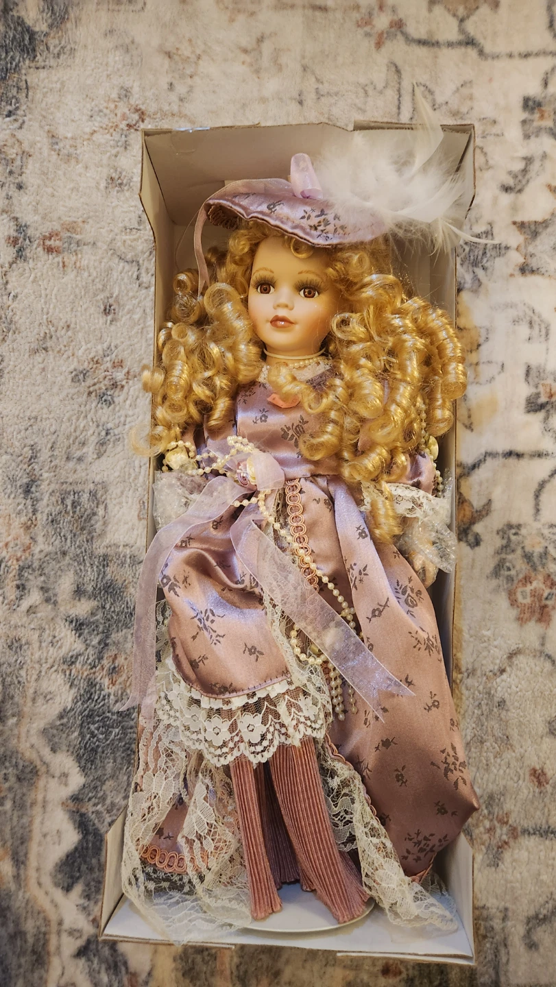 Vintage Style Porcelain Doll in Purple Dress