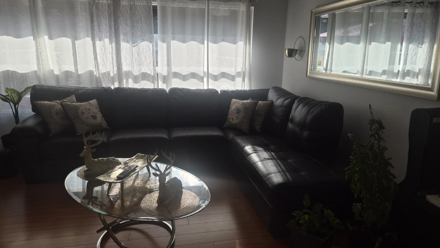 Dark brown faux leather sectional sofa