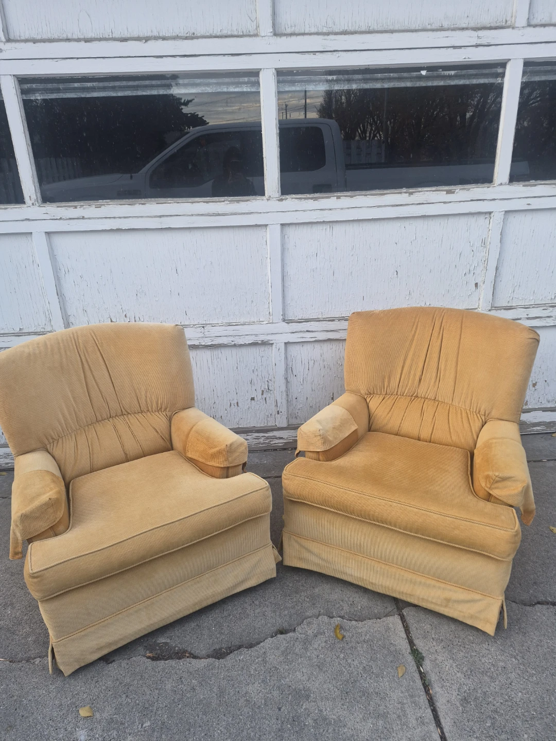 Two vintage yellow corduroy armchairs