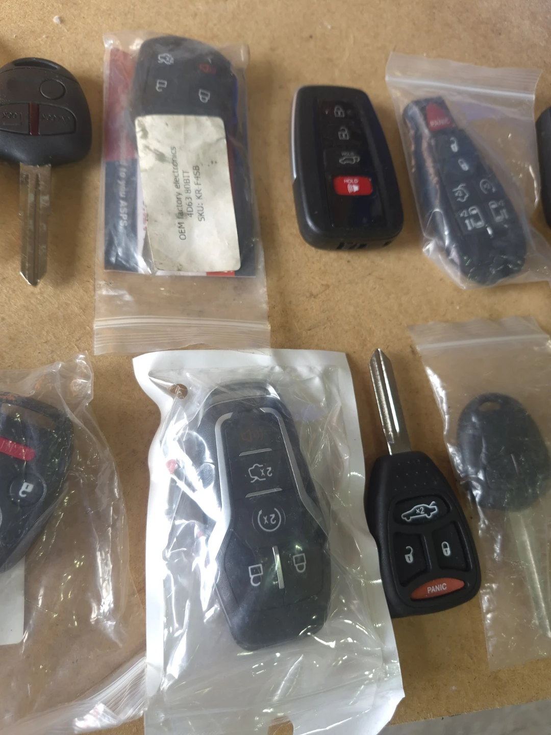 Collection of Assorted Automotive Key Fobs - photo 4