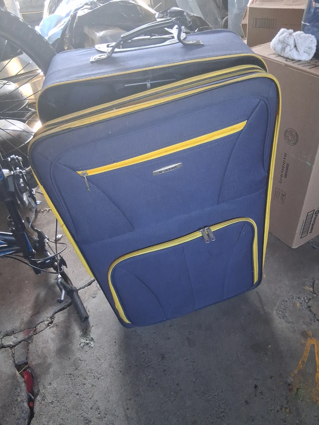 3 piece Rockland Blue and Yellow Softside Rolling Suitcase