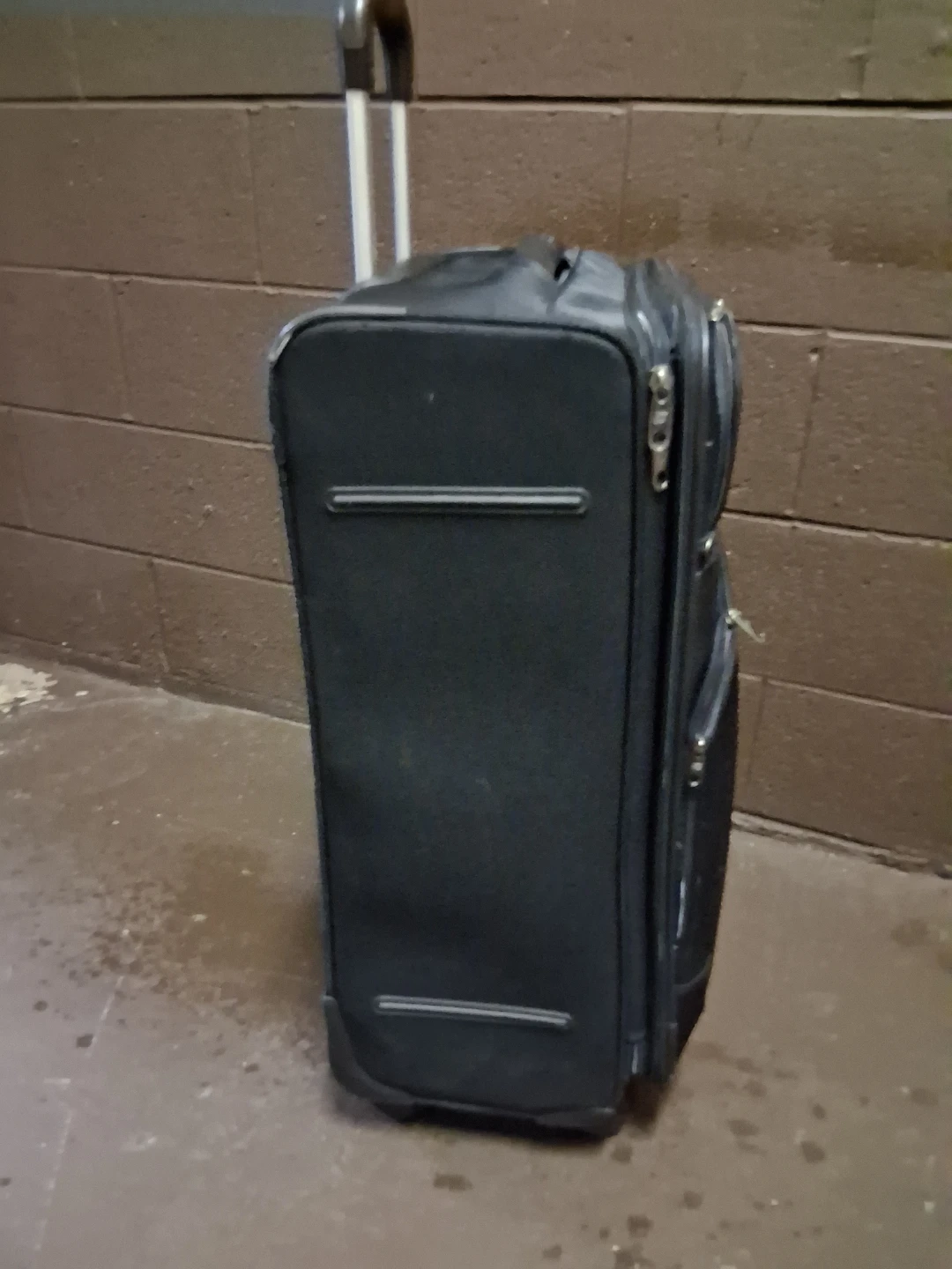 American Tourister Rolling Suitcase