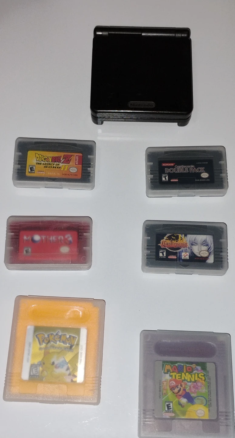 Nintendo Game Boy Advance SP and 6 Game Cartridges - photo 2
