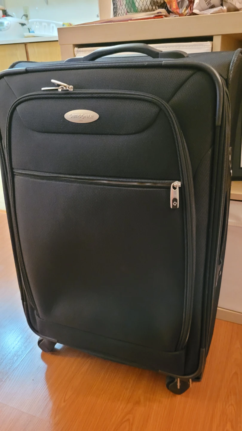 Samsonite Black Rolling Suitcase