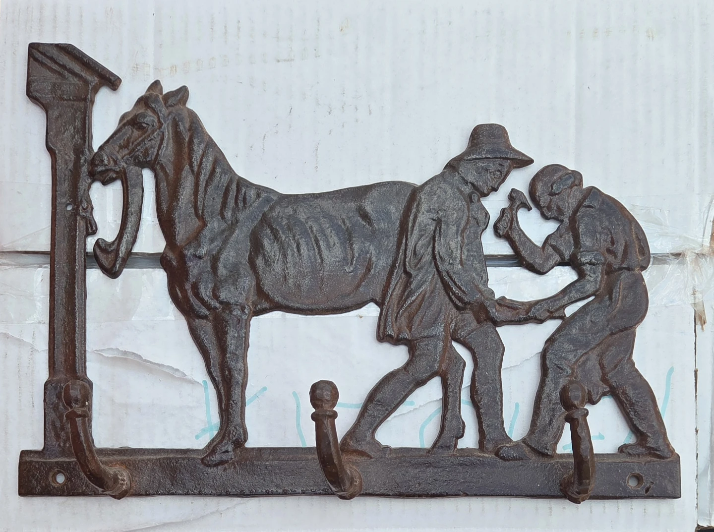 Cast iron coat rack