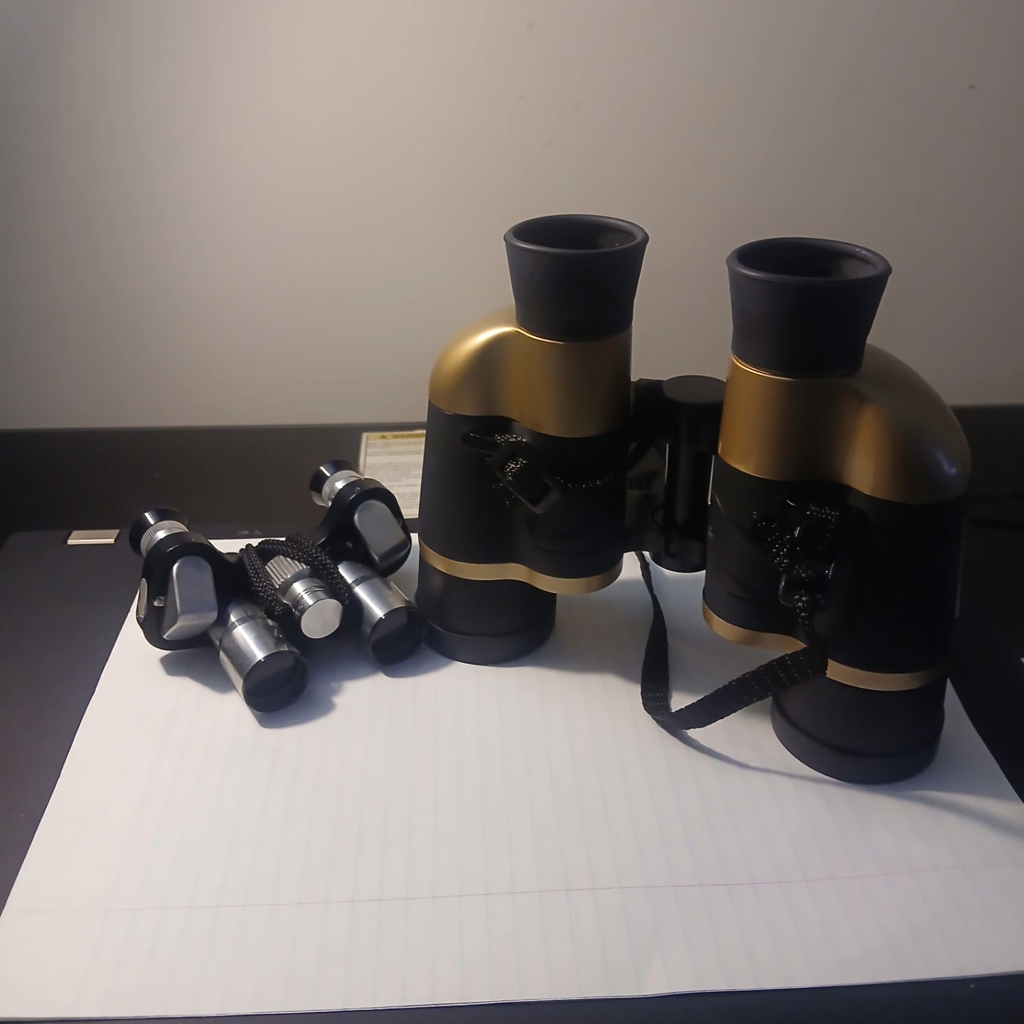 Black and gold binoculars