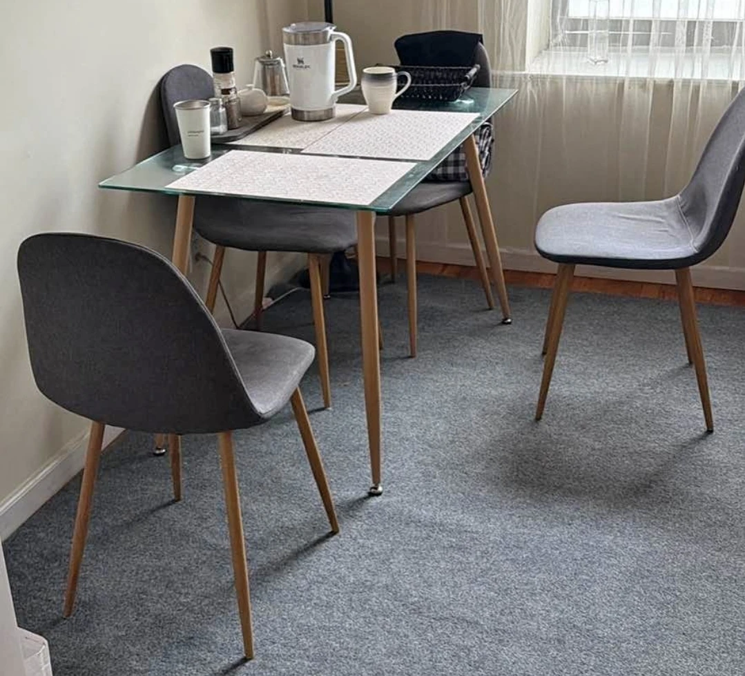 Glass Top Dining Table with 4 Gray Chairs