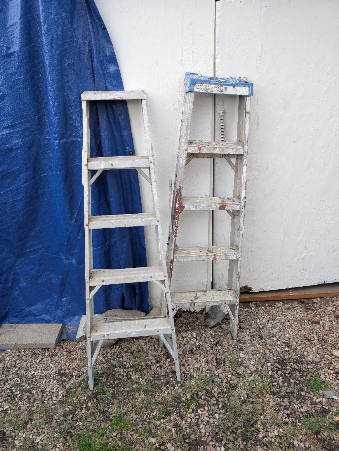 Ladders and wheel barroll