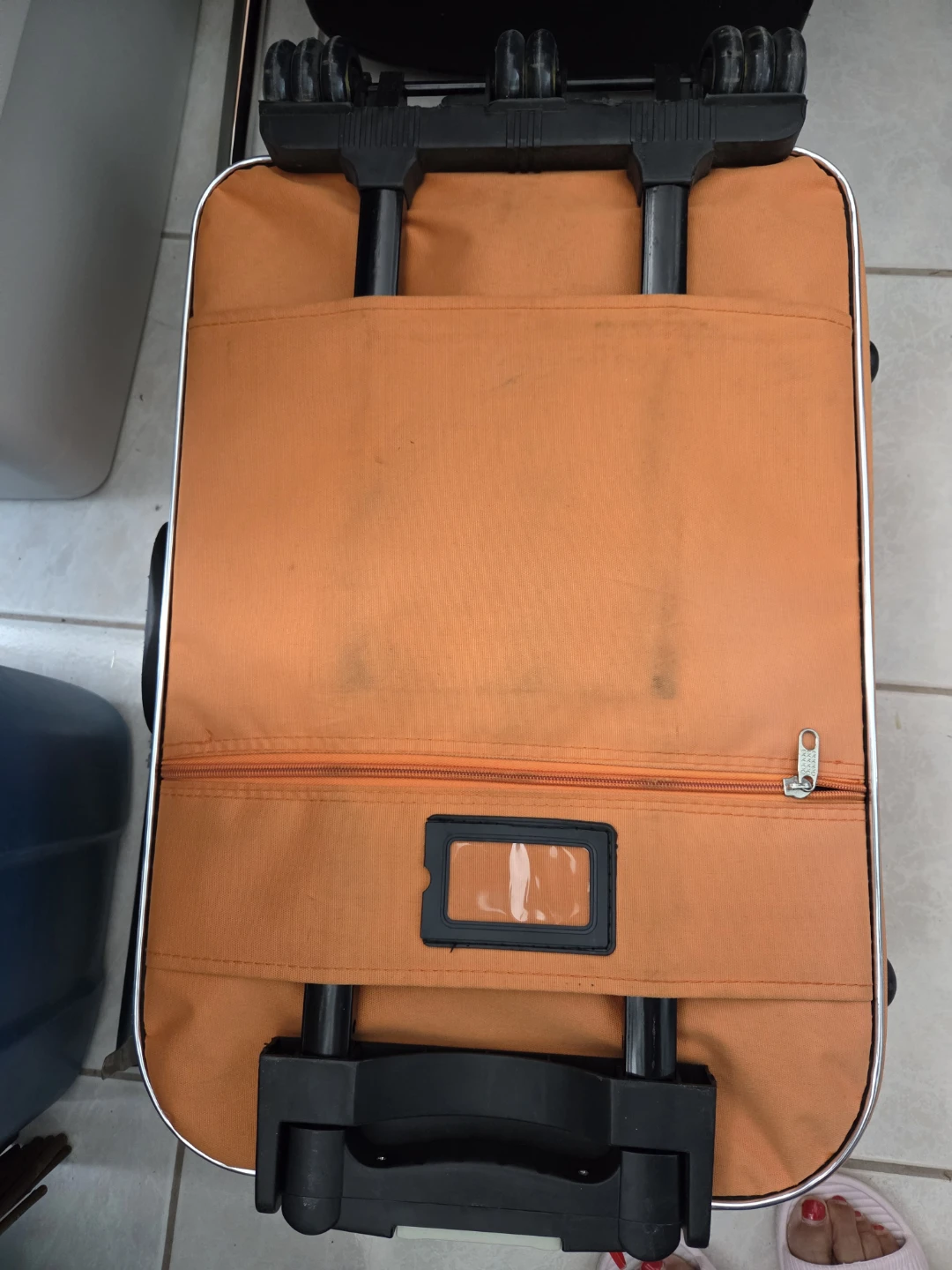 Orange rolling suitcase with combination lock - photo 3