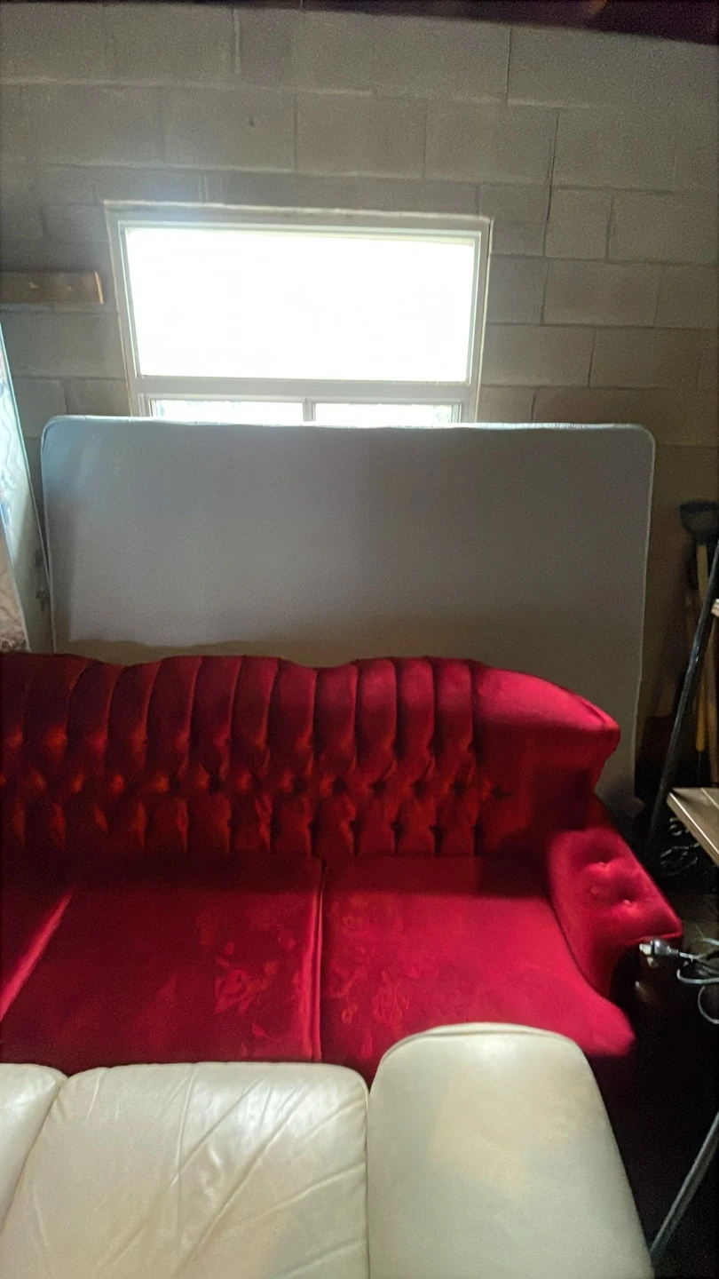 Vintage tufted red velvet sofa