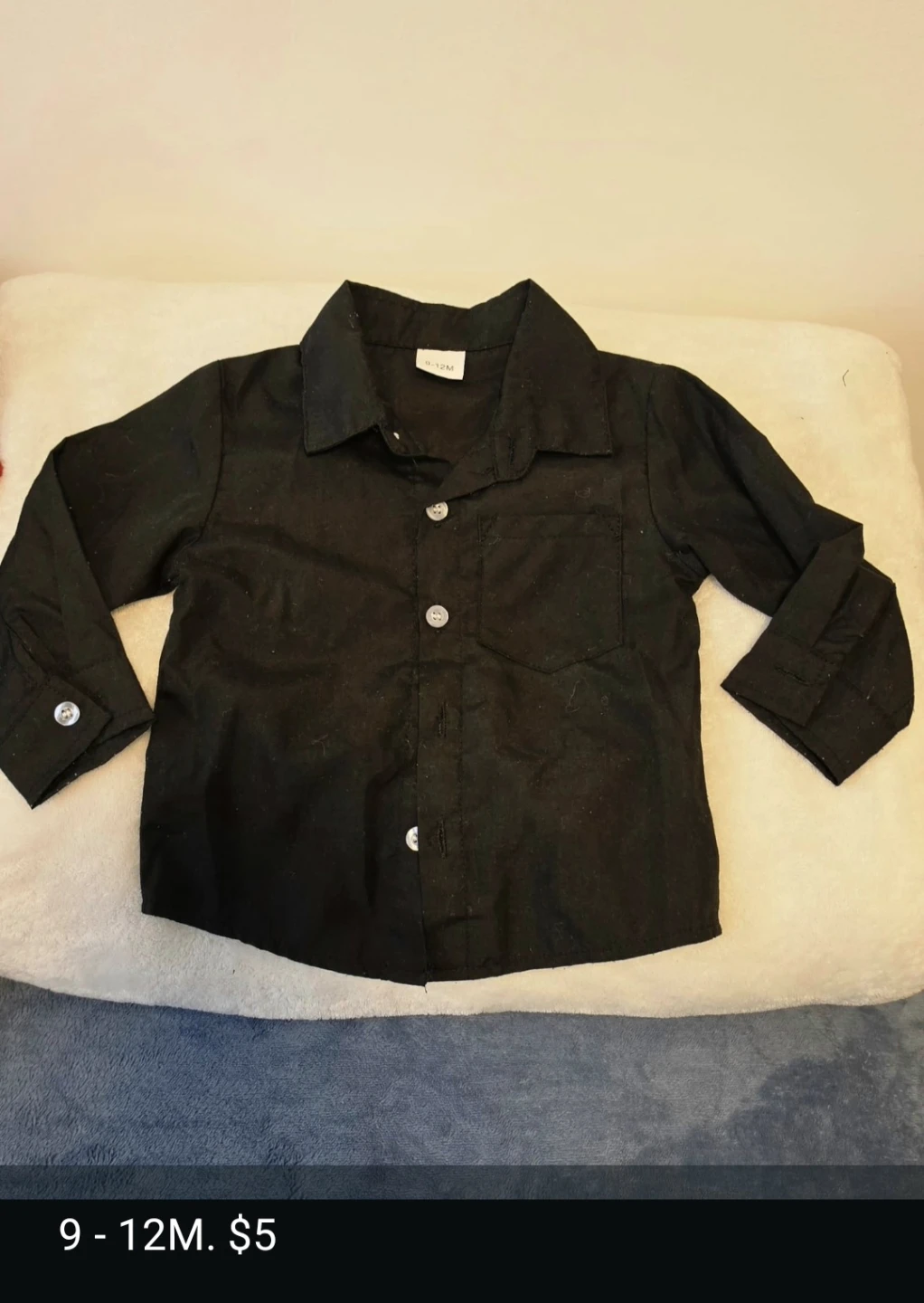 Black long-sleeve button-up shirt