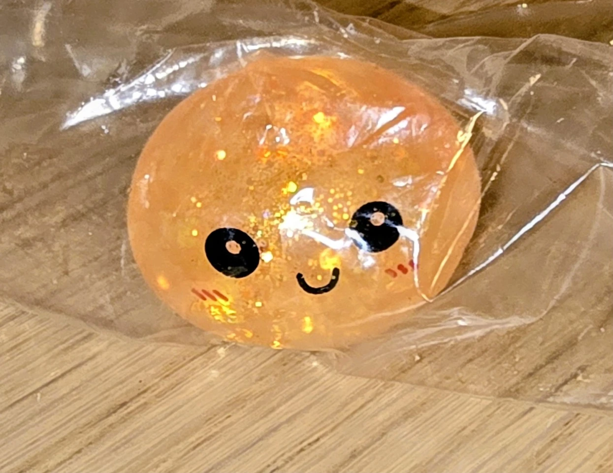 Orange Glitter Squishy Toy