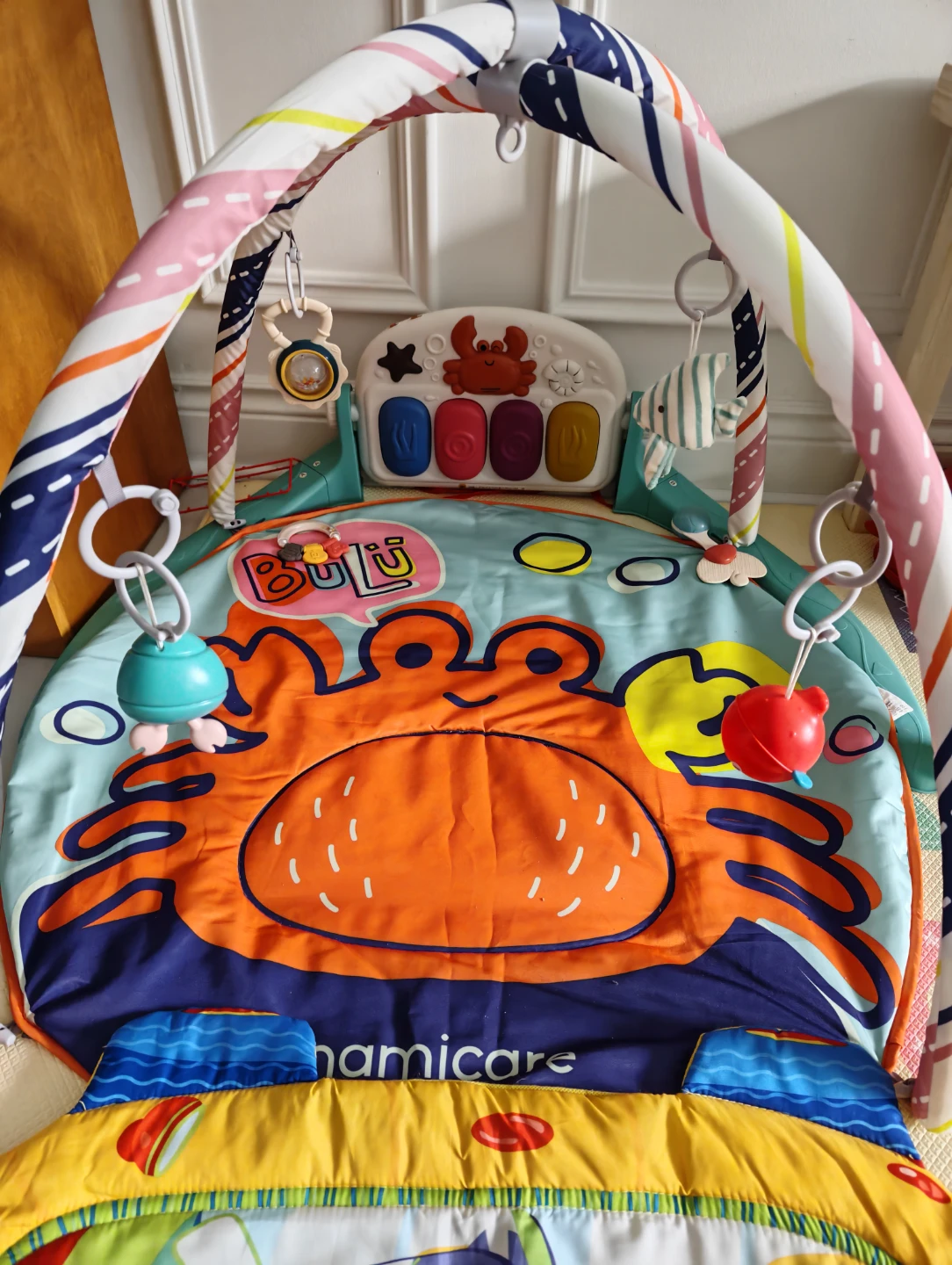 Bright Starts baby activity gym with piano