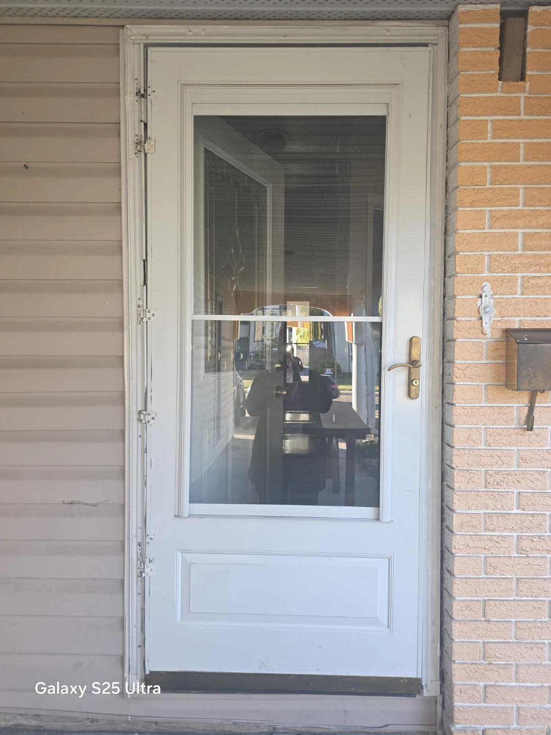 White storm door with brass hardware - photo 2