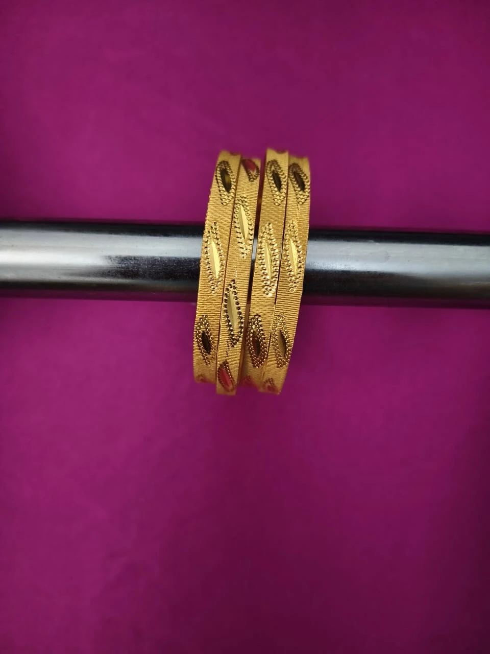 Set of 4 Textured Gold-Tone Bangles