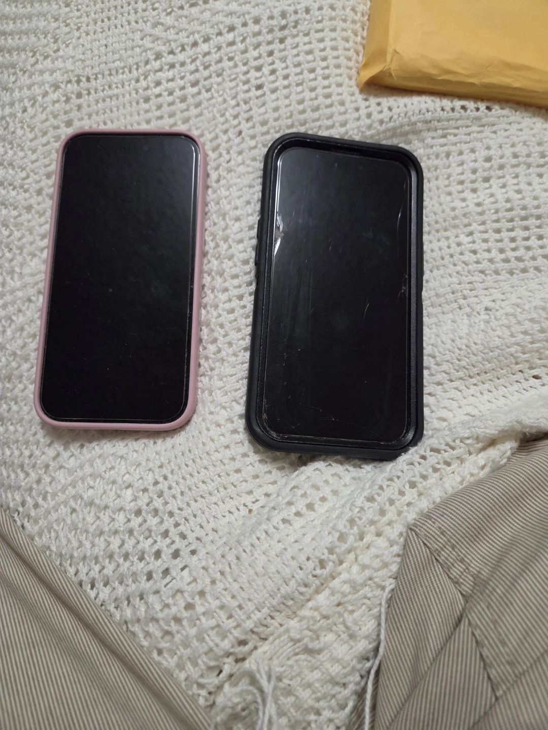 Two Apple iPhone 15's