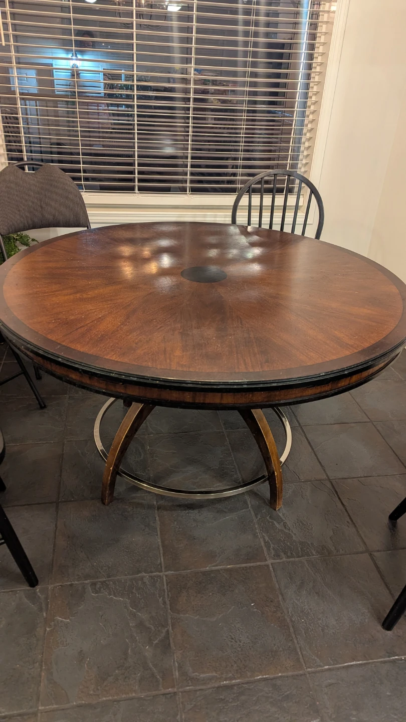 Round wooden dining table