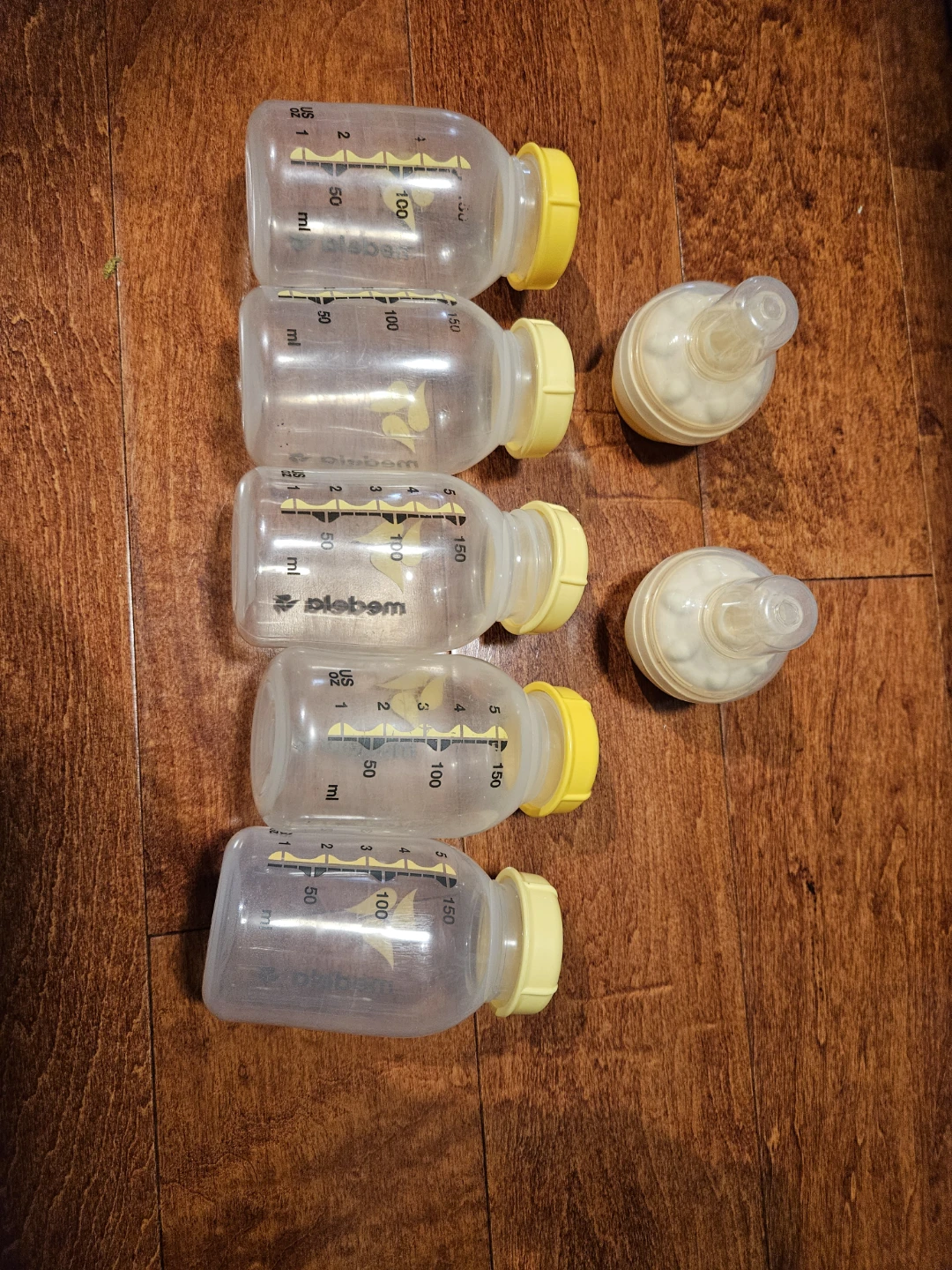 2 Medela calma and 5x 150ml Breast Milk Bottles